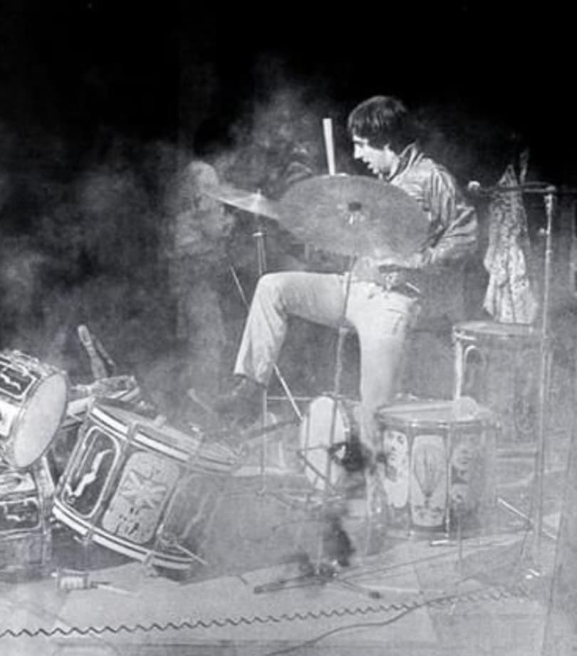 In September 1964, Pete Townshend made music history during The Who’s performance at Railway Tavern in Harrow and Wealdstone, smashing his guitar in the final moments of their set. Though this move inspired several other artists like Jimi Hendrix, Kurt Cobain and Jeff Beck to follow suit, none hopped on the trend quite like Townshend’s bandmate, Keith Moon.